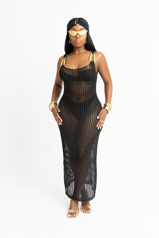 Black knit cover-up dress inspired by Havana. Features gold hardware, an open back, and a body-hugging fit. Perfect for beach-to-dinner glam.