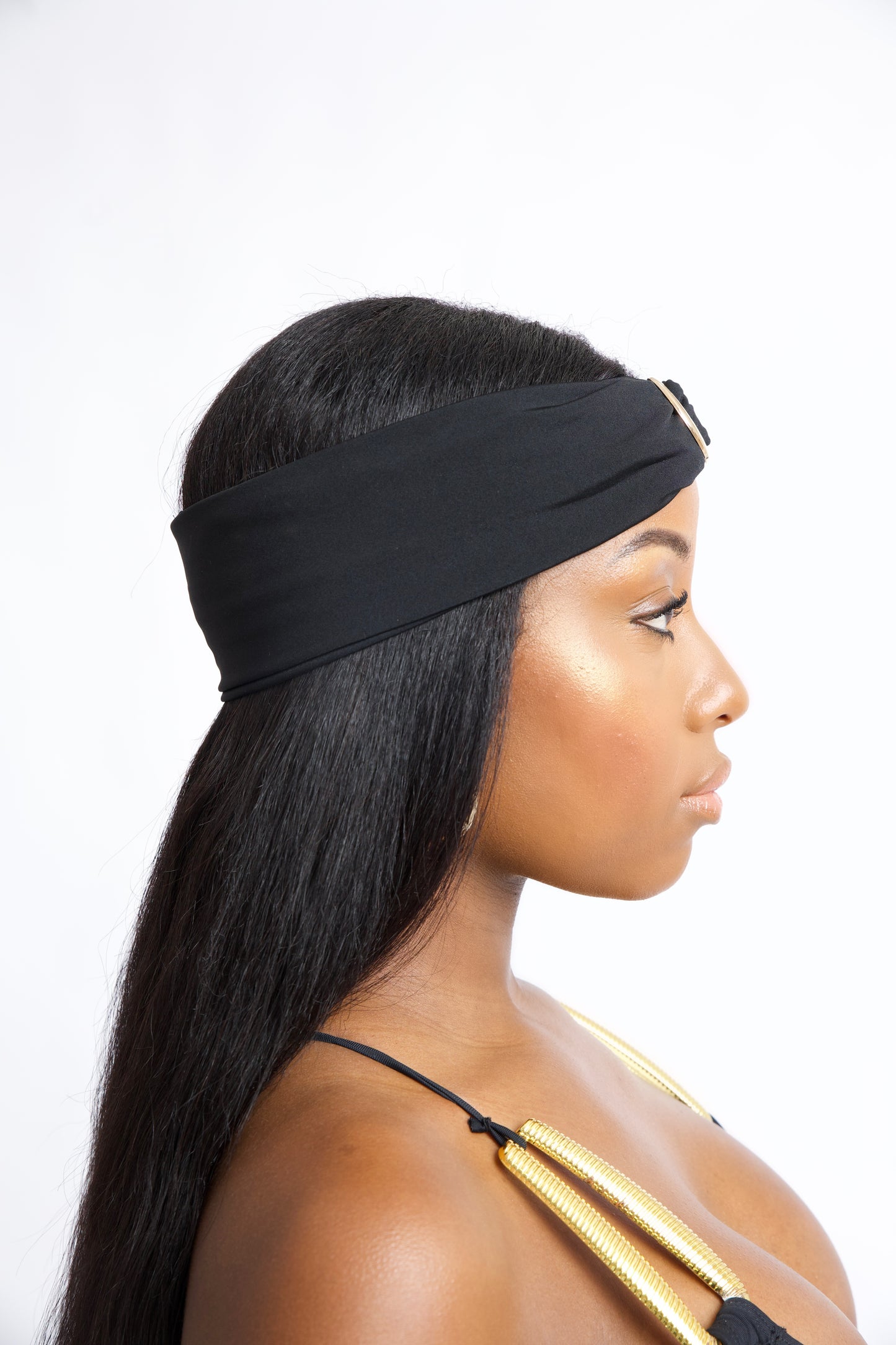 Black turban headband with gold hardware. Inspired by Mykonos, Greece. One size fits all. A chic vacation-ready hair accessory.