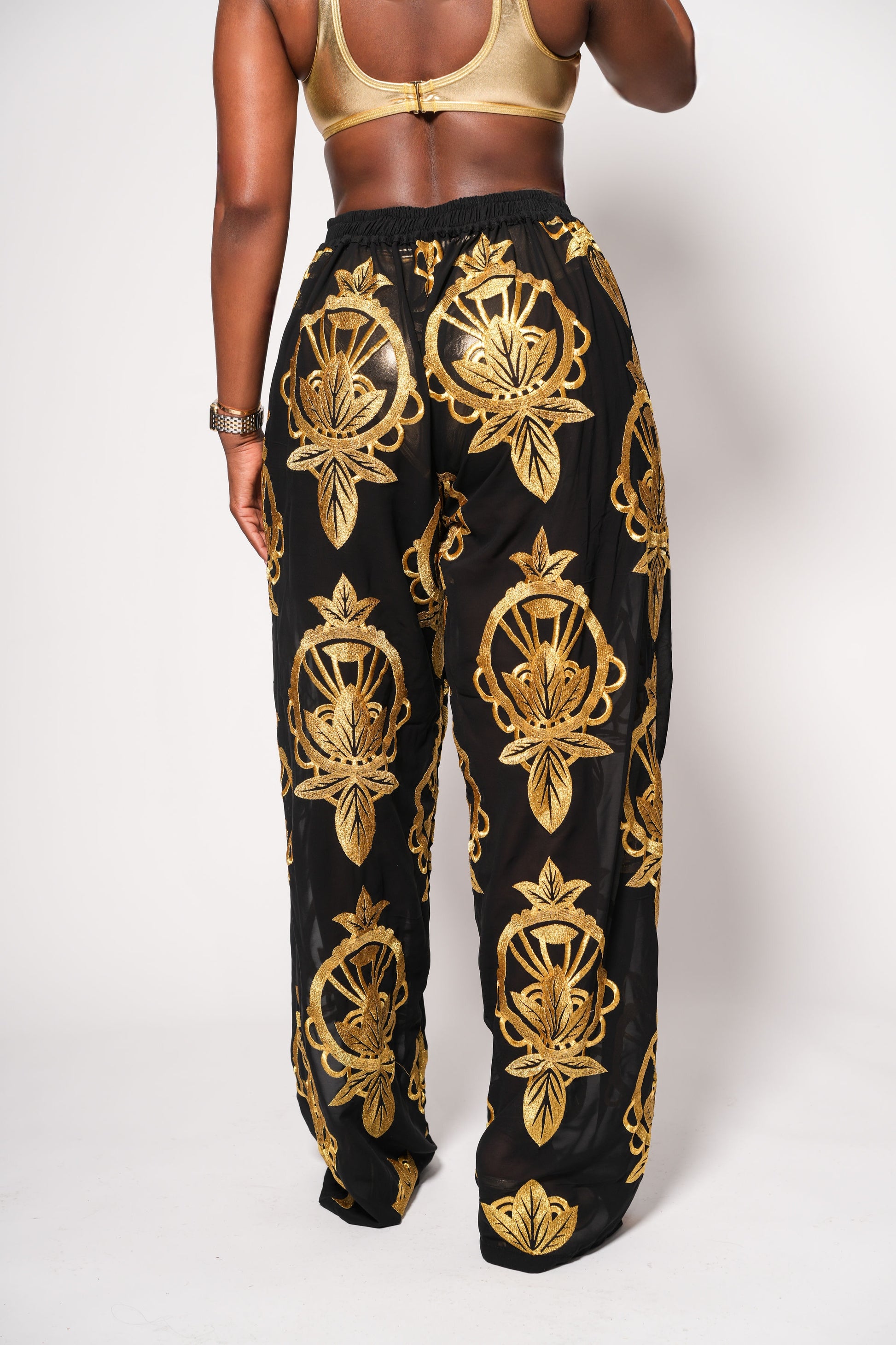 Black sheer wide-leg pants with gold embroidery. Designed to match the Florence Blouse. Pre-order now for August shipping.